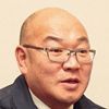 遺品整理ネクストを運営する株式会社ネクストの代表取締役社長である佐倉賢次郎の顔写真です。